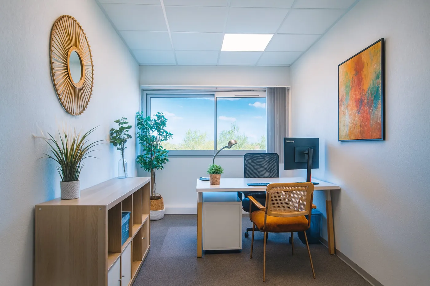 Fully equipped 15 m² office for one person at the Millénaire coworking centre with bright window and curated decor